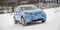 BMW опубликовала снимки i3 в камуфляже
